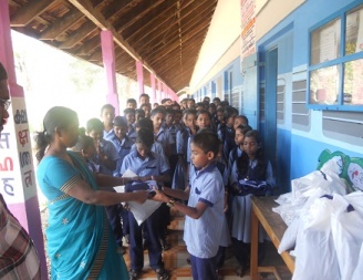 Uniforms being handed over to the students